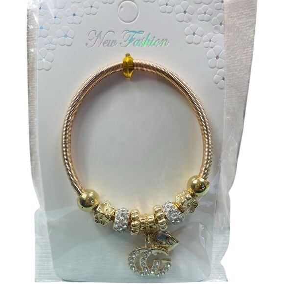Fashion Gold and Silver GG Stretch Charm Bracelet - Picture 1 of 3
